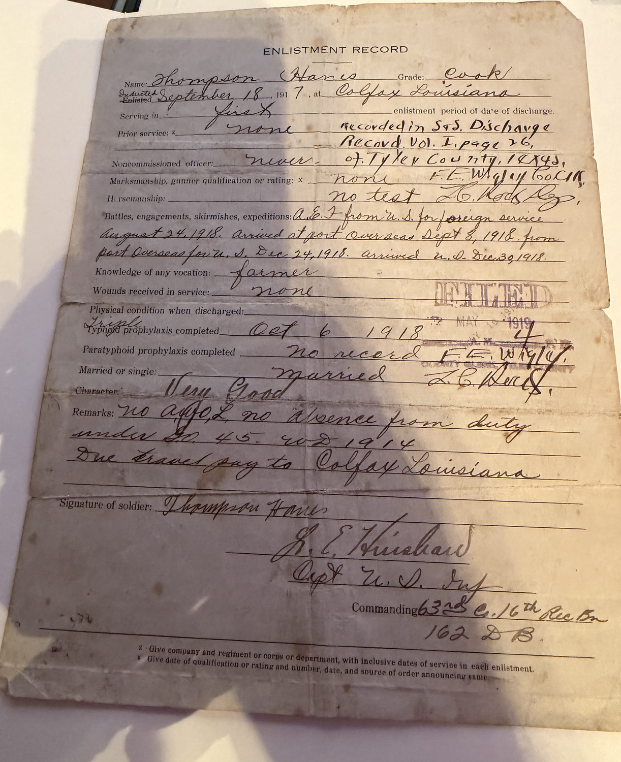 The companion Enlistment Record sheet for Thompson Hanes, handwritten, recording induction at Colfax, Louisiana, on September 18, 1917, foreign service from August 24, 1918, arrival overseas September 8, 1918, character Very Good, and his signature.
