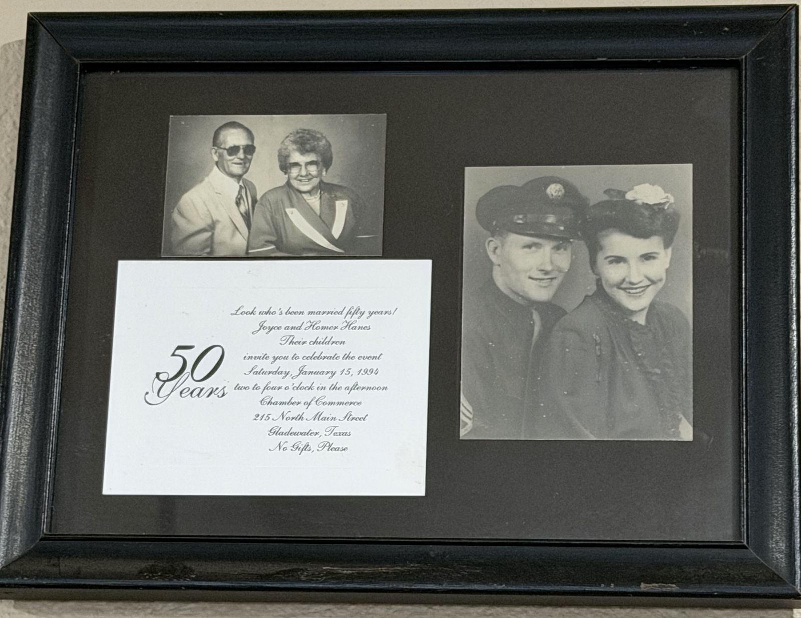 A black frame holding three items: a young portrait of Homer Hanes in Army uniform and cap beside Joyce Hanes, a later photograph of the couple, and a printed invitation reading Look who's been married fifty years, Joyce and Homer Hanes, Saturday, January 15, 1994, Gladewater, Texas.